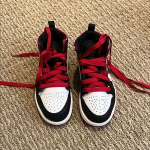 Nike Jordans Kids Black and White Sneakers with Red Laces
